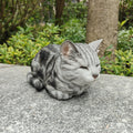 87729-D - Tabby Tranquility: Whimsical Black Polyresin Napping Cat Figurine Hi-Line Gift Ltd.