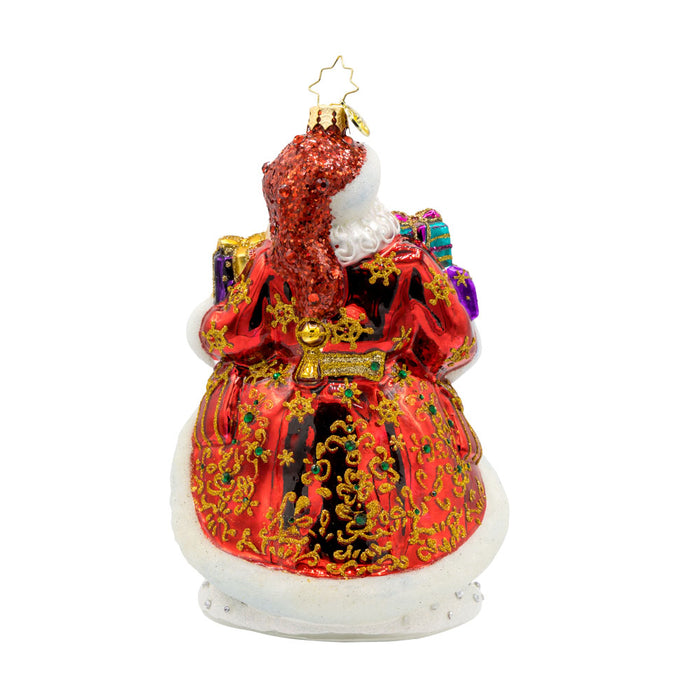 A Santa For All Seasons ornament. Santa in his intricately detailed satin coat surrounded by gifts galore. View of back.