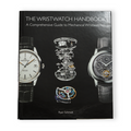 The Wristwatch Handbook cover with a central exploded watch movement and two wristwatches on the sides