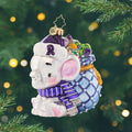 An Elephant Never Forgets! Ornament of an elephant carrying a bag of presents, while being decorated in purple to being awareness to Alzheimer's. View of front