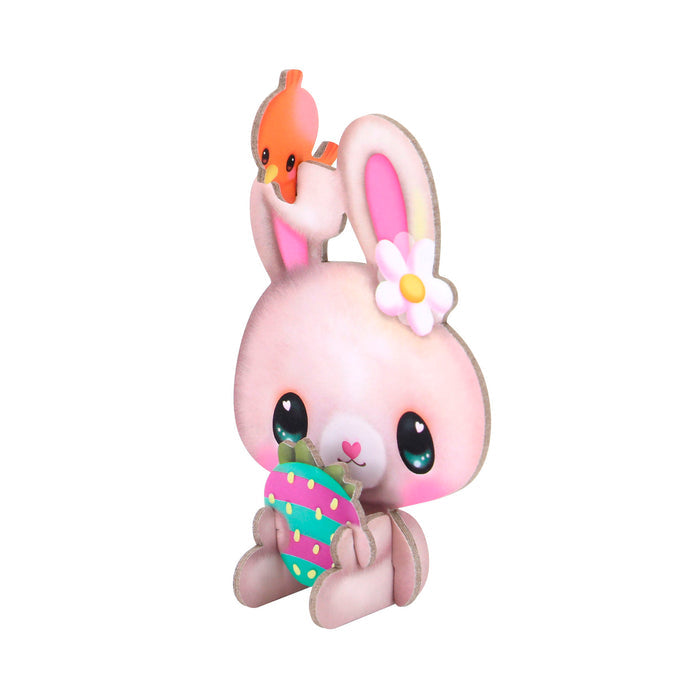 A cute cartoon pink bunny with big blue eyes holds a decorated Easter egg, white flower by one ear, and an orange bird on its head—perfect for creative play in any Santoro BangoBerry Pop-Out Playscape scene.