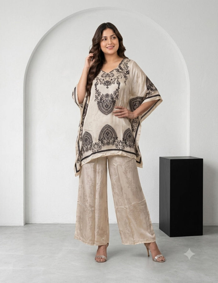 Model wearing a beige silk kaftan set with dark brown print and matching trousers.