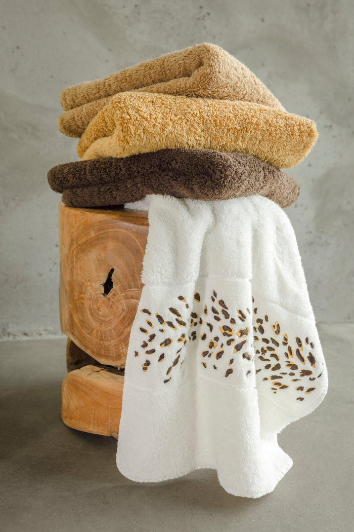 A&H Bengale Hand Towels feature 795 Mustang and 840 Gold embroidery. The base hand towel is 100 White