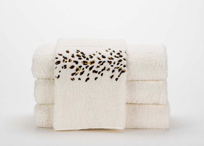 A&H Bengale Hand Towels feature 795 Mustang and 840 Gold embroidery. The base hand towel is 100 White