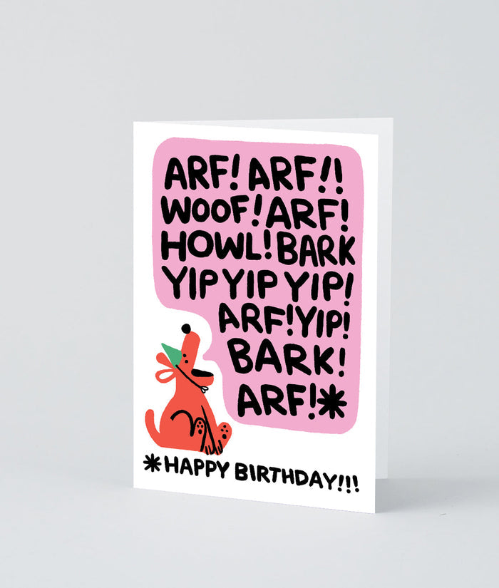 image of birthday card shows an illustrated dog with a large speech bubble filled with barking words and it says happy birthday at the bottom