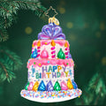 Front image - Birthday Bash Bauble - (Happy Birthday Christmas) - Ornament of a two-tier happy birthday cake adorned in colors of pink, purple, blue, green, yellow.
