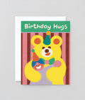 a big birthday bear hug on this stripy birthday card for kids. a big yellow bear hugs a person in a party hat and it says Birthday Hugs on a green background.