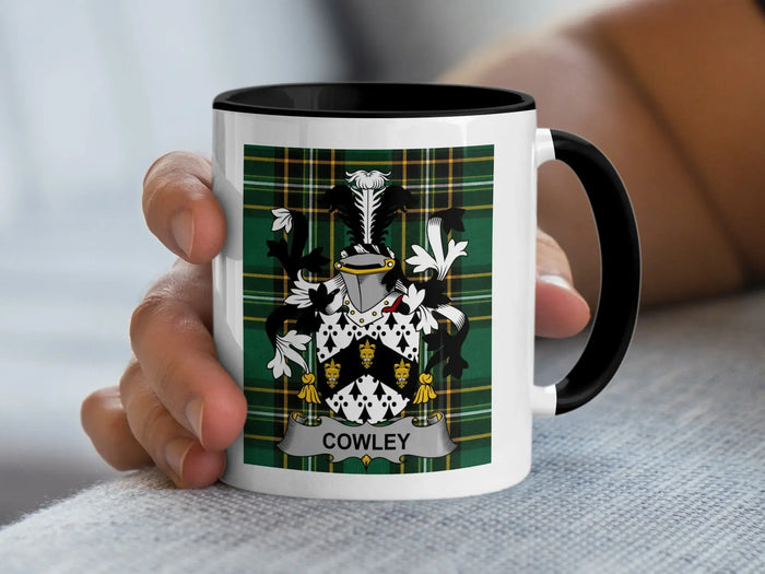 Cowley Irish surname mug with family crest on an Irish National Tartan background.