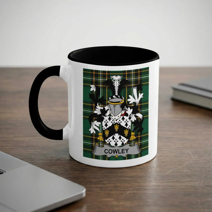 Cowley 11oz ceramic mug with black rim and surname emblem on Irish tartan.