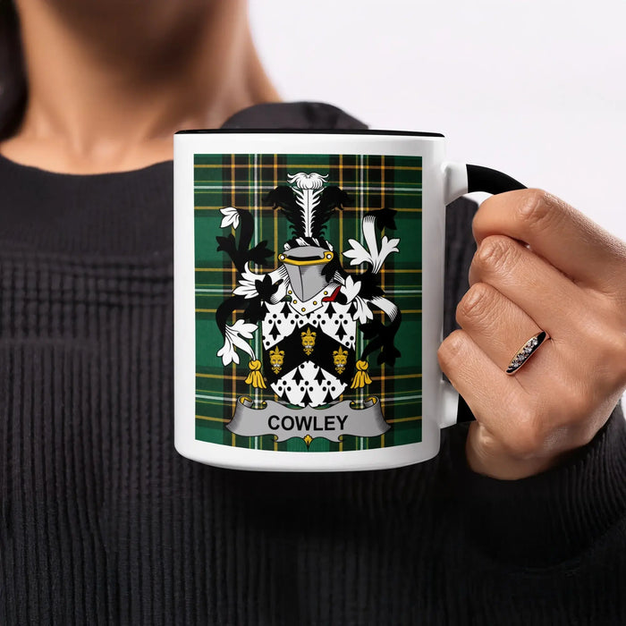 Cowley heritage mug featuring the family crest, black handle and tartan design.