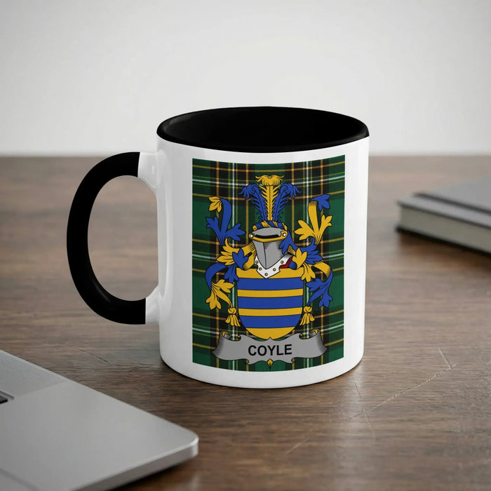 Mug with a family crest and the name "COYLE" on a checkered background.