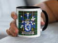 Creighton Irish family crest accent mug with a black rim and handle