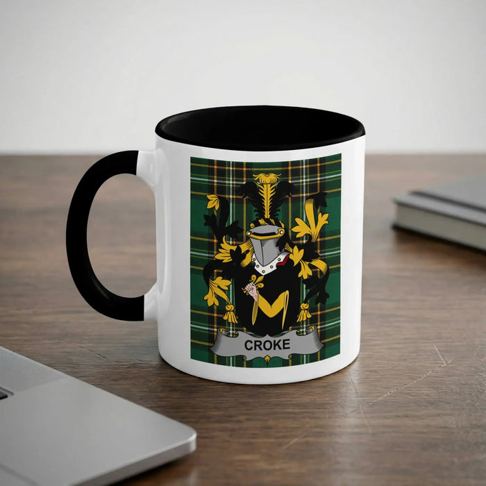 White mug with black handle, featuring the "CROKE" family crest on a plaid background.