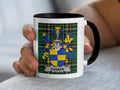 Mug featuring the Cusack family crest on a tartan background.