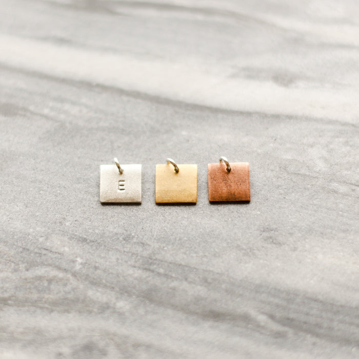Custom Hand Stamped Name or Initial Square Charm | EKATE | Golden Rule Gallery | Excelsior, MN