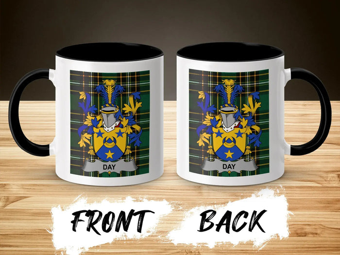 White mug with black handle featuring the "DAY" coat of arms on a plaid background.