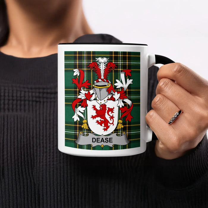 Mug with Dease family crest on green tartan background.