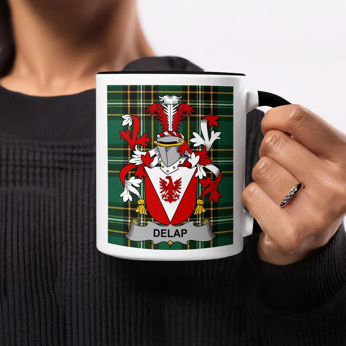 Mug with green tartan background and Delap family crest in red and white.