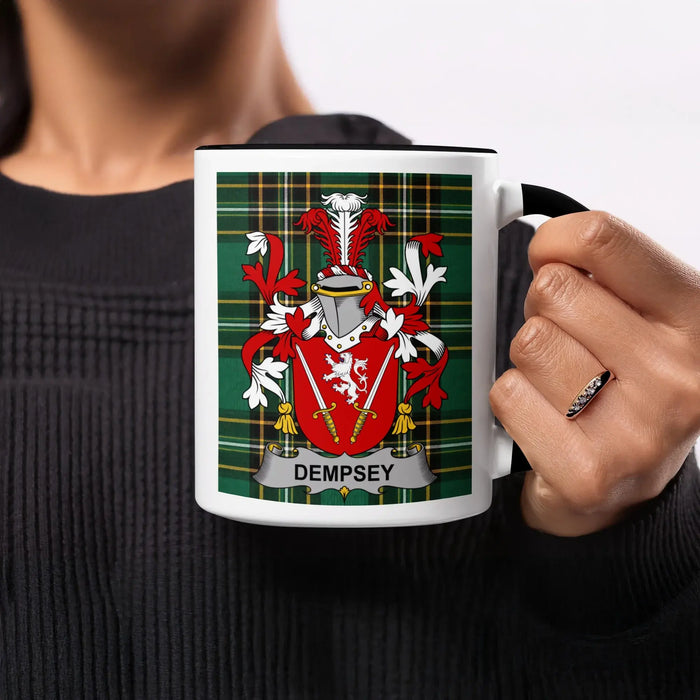 Black mug featuring the Dempsey family crest on a green tartan background.