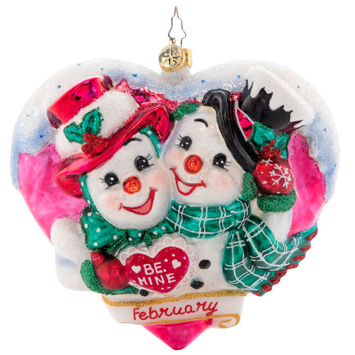 Front - Ornament Description - Forever And Always: Love is in the air! Adorning the second piece in our Ornament of the Month collection, two snowy sweethearts exchange love letters, valuing each other's company this Valentine's Day.