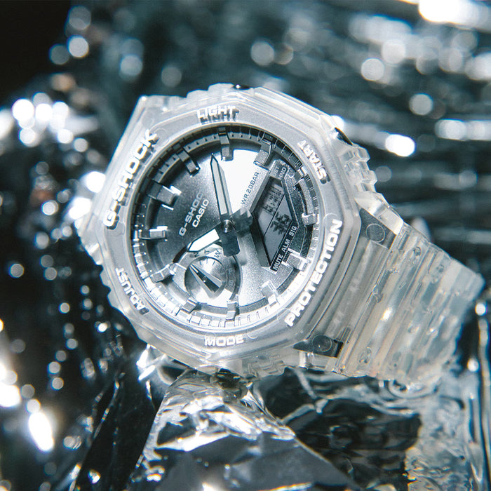 Close up of silver GA2100BM-7A8 G SHOCK watch with metallic dial and digital display