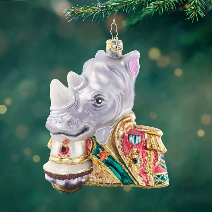 Front image - General Regal Rhino - (Rhino ornament) - Ornament of a rhino in a red and green suit with gold detailing.