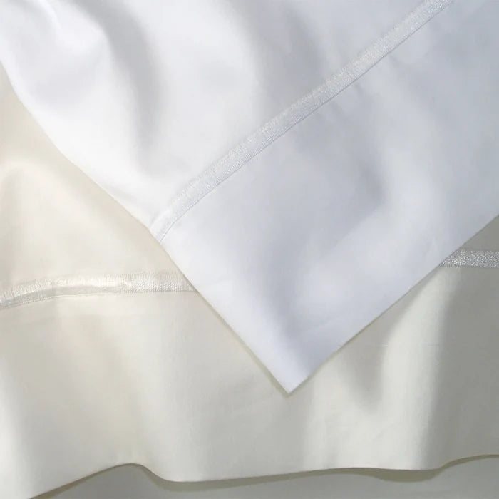 St Genève Grand Veneto Pillowcases in white (top) and cream (bottom) at TMASC