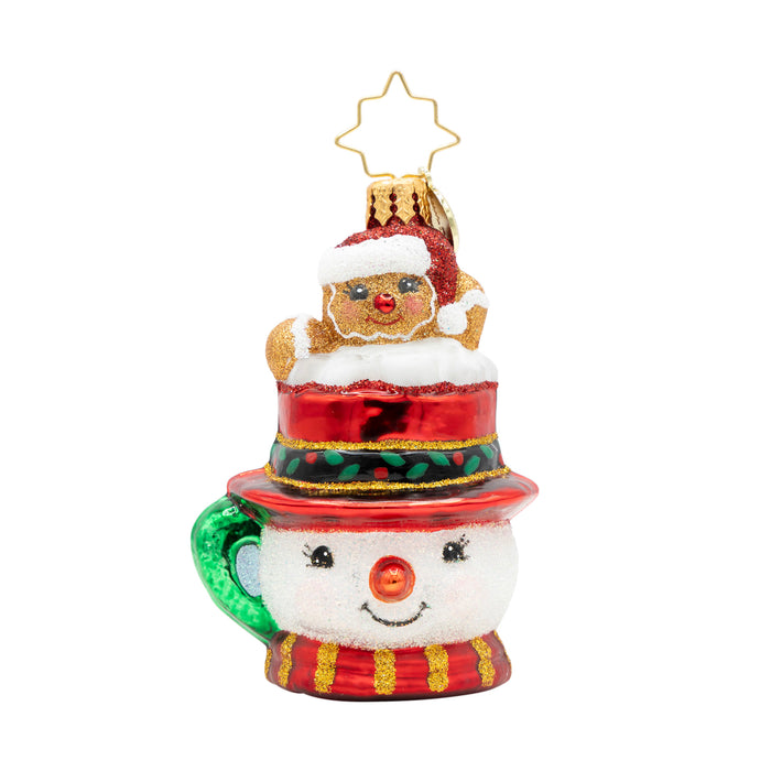Front view of a snowman ornament shaped like a mug with a  gingerbread man sitting on top of the hat design on a white background