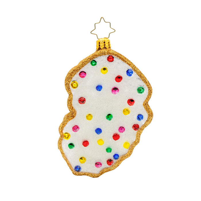 Jolly Gingerbread Santa ornament. A gingerbread cookie of Santa's head. View of back.