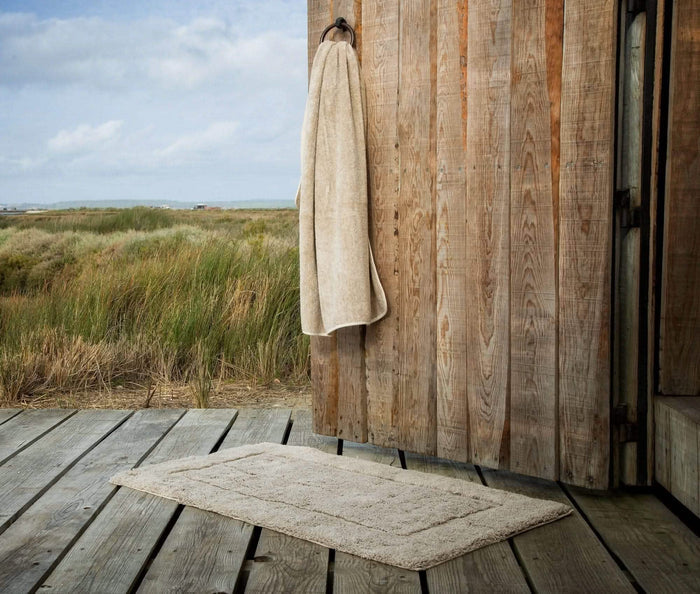 A&H Must Bath Rug in 770 Linen (31 x 63"). A&H Lino Bath Sheet in two-tone 101 Ecru (100% Giza Egyptian Cotton ELS) and 770 Linen (100% Linen)