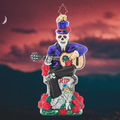 Ornament Description - Love Everlasting: Proof that romance isn't dead…it's undead. A spooky skeleton serenades his beloved beyond with a haunting love song surrounded by blood red roses.