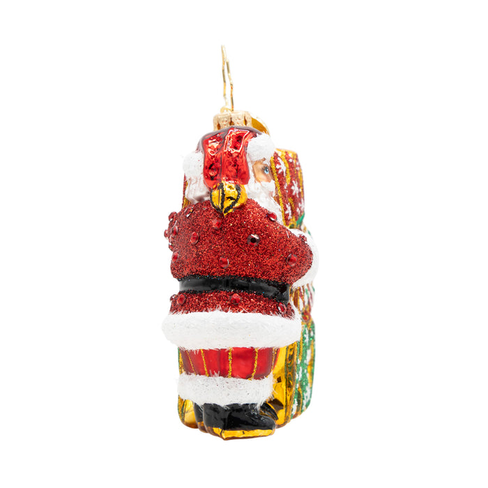 Decorative Christmas ornament shaped like a Santa Claus side of body on a white background.