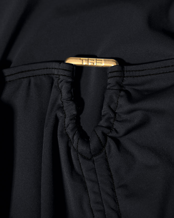 Detail shot of hardware on the Mini Triangle Skirty - Black
