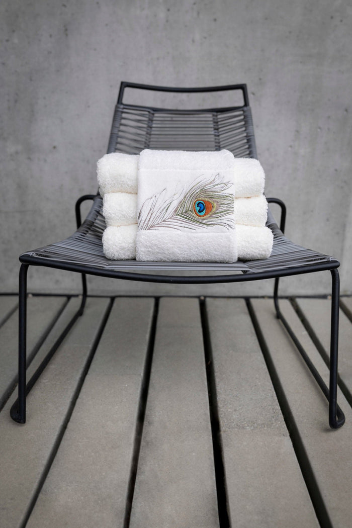A&H Paleo Hand Towels feature 737 Caramel embroidery. The base hand towel is 100 White