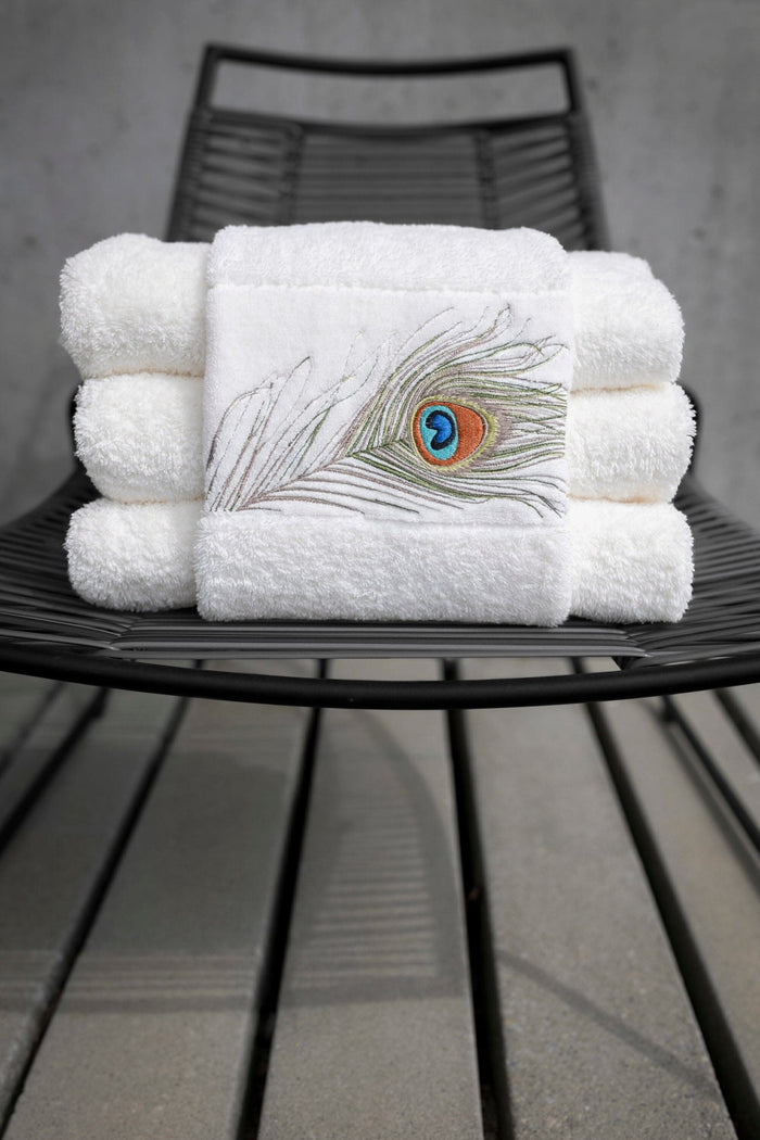 A&H Paleo Hand Towels feature 737 Caramel embroidery. The base hand towel is 100 White