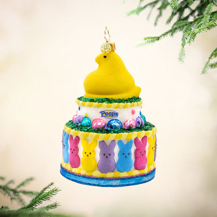 This charming PEEPS cake ornament is stacked with colorful candies and cute shapes. View of right side.