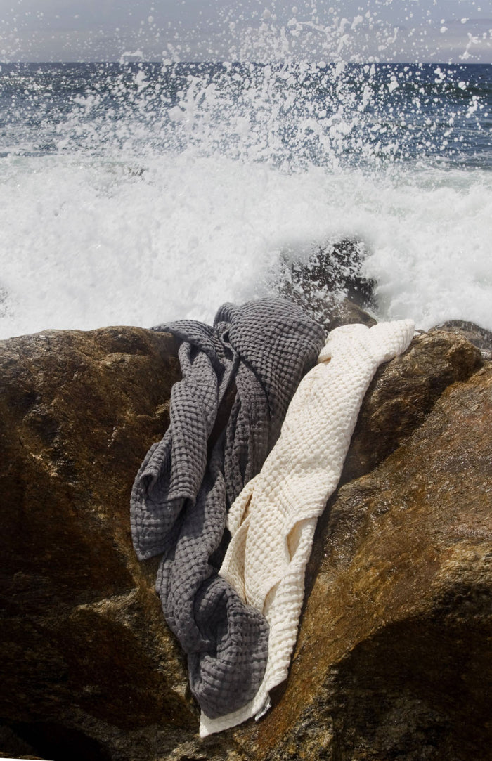 A&H Pousada Waffle Towels in 920 Gris (left) and 103 Ivory (right)