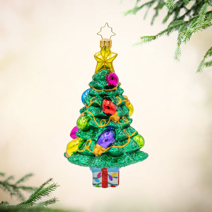 Radiant Evergreen Pine ornament. This Christmas tree has oversized lights that sparkle and glow. View of front.