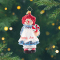 Raggedy Sweets. Ornament of a Raggedy Ann doll holding a peppermint. View of front