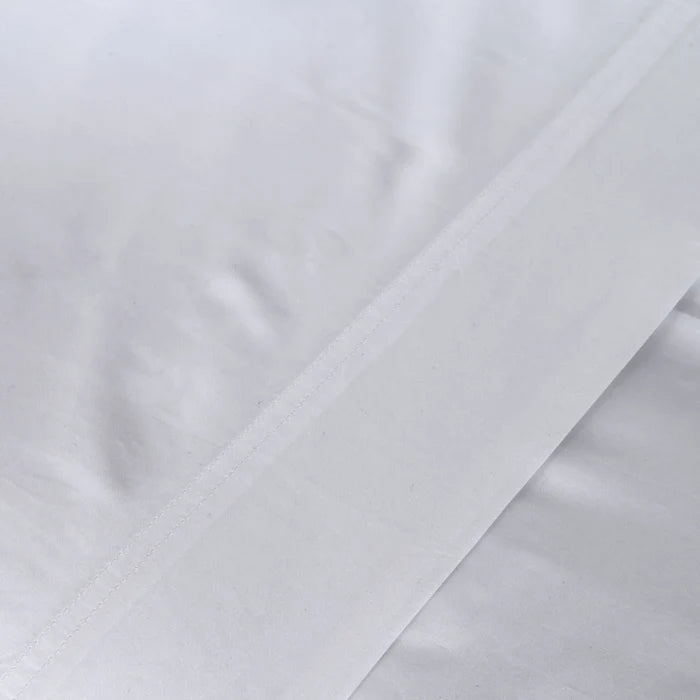 St Genève Sintra 300 thread count percale bedding in crisp white. Available in duvet covers, flat/fitted sheets, shams and pillowcases