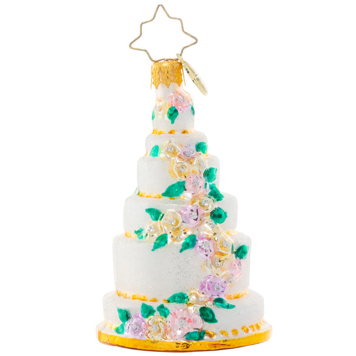 Back - Ornament Description - Six-Tier Celebration Gem: Be the envy of every baker with this towering tiered cake ornament. Decorated with a cascade of colorful spring blooms, it's lucky that it's the kind of cake that will last year after year because this piece is almost too beautiful to eat!