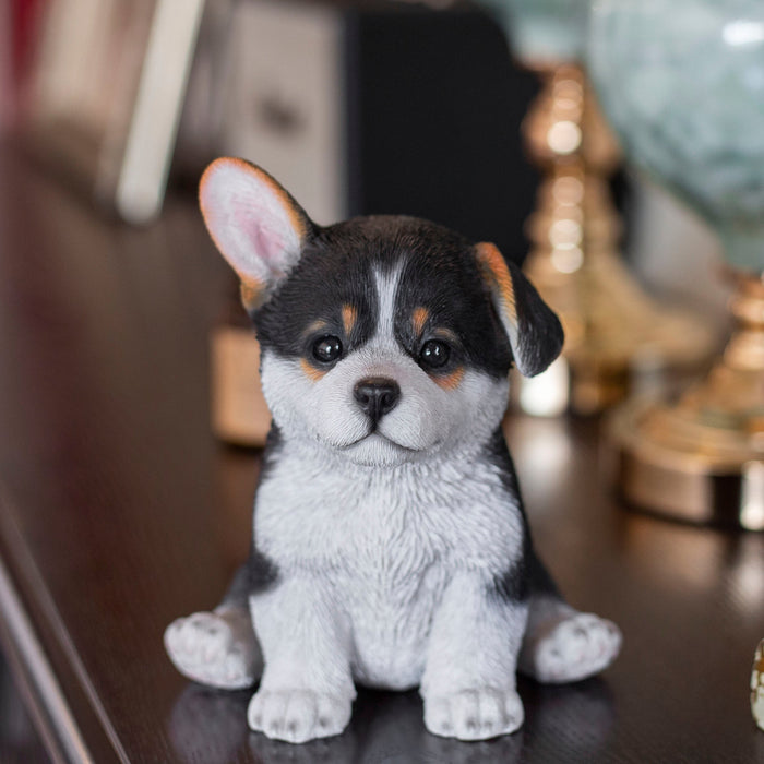 87624-32-soreal-black-and-white-corgi-decorative-puppy-figurine Hi-Line Gift Ltd.