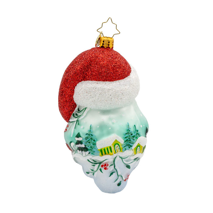 St Nick's Winter Tale ornament. Santa's smiling face and snowy scene with intricate details and a hand-painted beard. View of back.