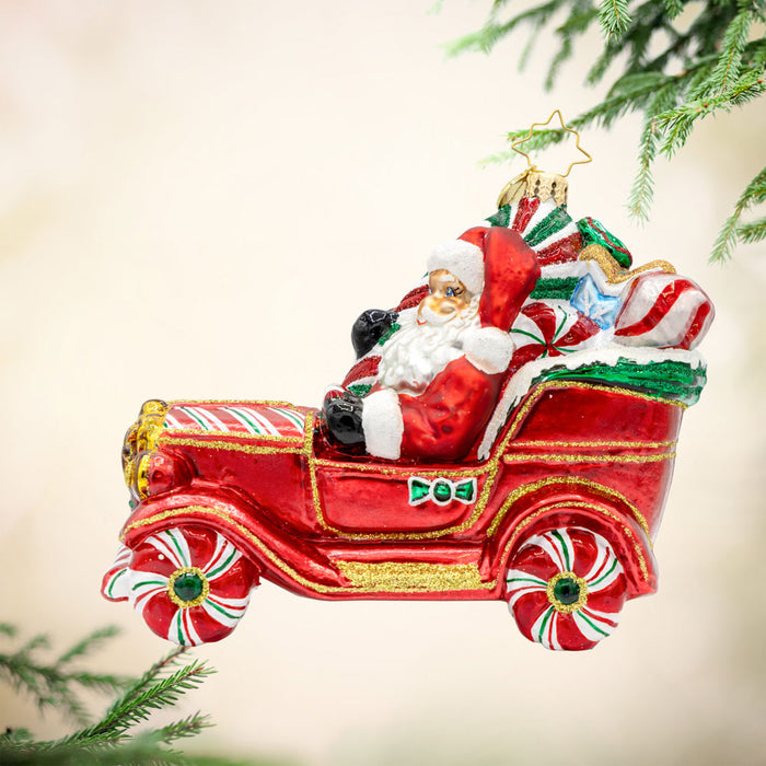Sweet Ride Cruiser ornament. Santa drives his red candy-themed car. View of front.