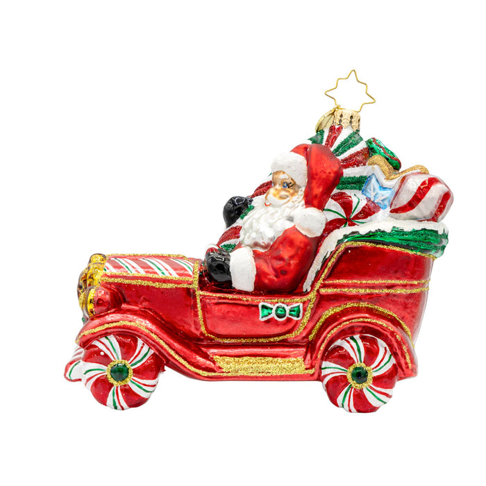 Sweet Ride Cruiser ornament. Santa drives his candy-themed car. View of front.