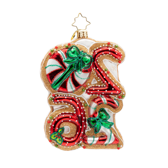 Back side of Ornament of the year 2026 in peppermint colors and white polka dots with three green bows and gold outlining.