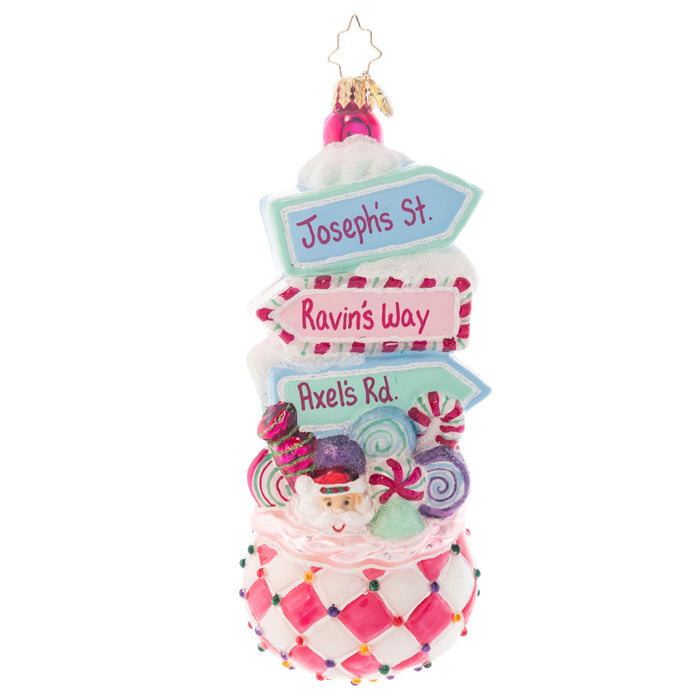 Ornament Description - Sweet Street Treat: Whether you are strolling along Candy Cane Lane or making your way to Sweet Street, you are sure to find this sugary signpost a delight this Christmas! Hand painted with a bright whimsical candy palette, this Christopher Radko ornament will give you sweet dreams throughout the season. Add your own custom street names to each sign to create a truly unique piece
