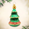 The Gilded Evergreen.  Tree ornament adorned with green tinsel, red and white gems, and gold detailing. View of front
