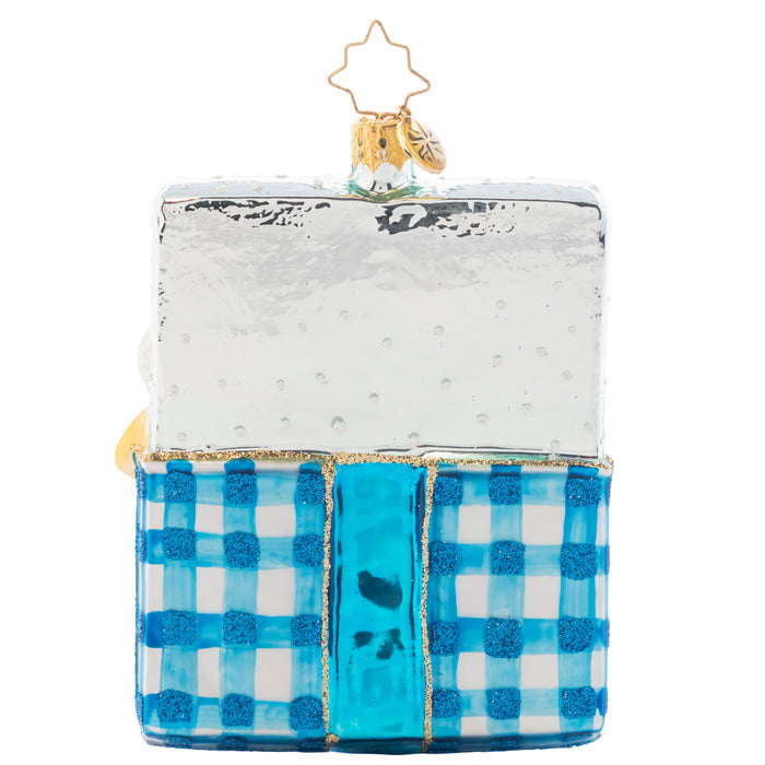 Back - Ornament Description - Trunk Of Toys Baby Boy!: How many gifts can we possibly fit into this toy chest? Quite a lot! This box full of goodies is sure to enchant your newest bundle of joy this Christmas season. Add your own personal message on this ornament to create a one of a kind piece. Note: Please allow approximately one week (on top of shipping time) for our elves to personalize your ornament.